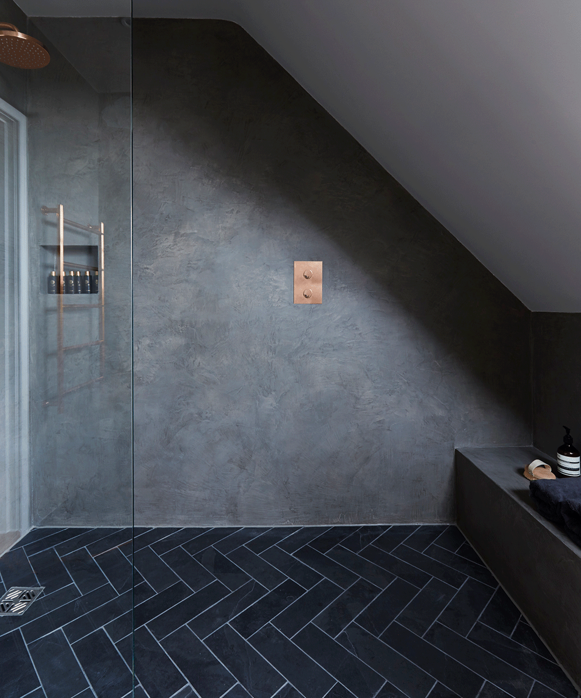 Dark wet room with sloping wall