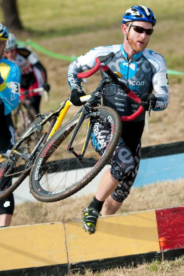 Robert Marion leads the chase group through the barriers.