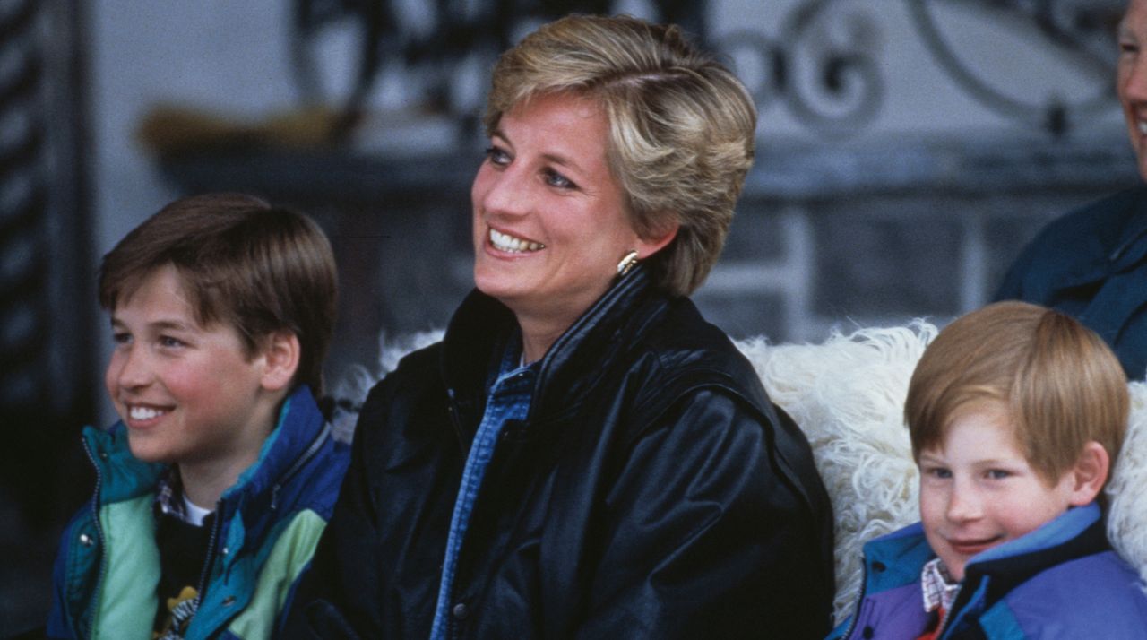 Princess Diana rides a sled with Prince William and Prince Harry