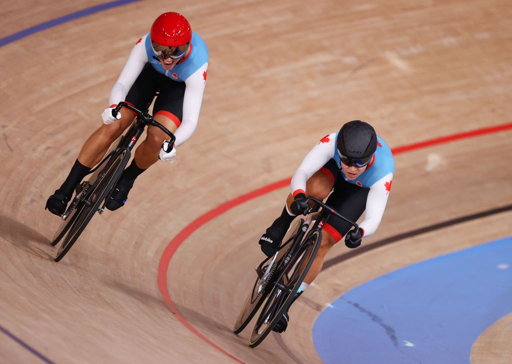 IZU JAPAN AUGUST 07 LR Kelsey Mitchell and Lauriane Genest of Team Canada sprint during the Womens sprint quarterfinals race 2 heat 2 of the track cycling on day filthen of the Tokyo 2020 Olympic Games at Izu Velodrome on August 07 2021 in Izu Shizuoka Japan Photo by Justin SetterfieldGetty Images