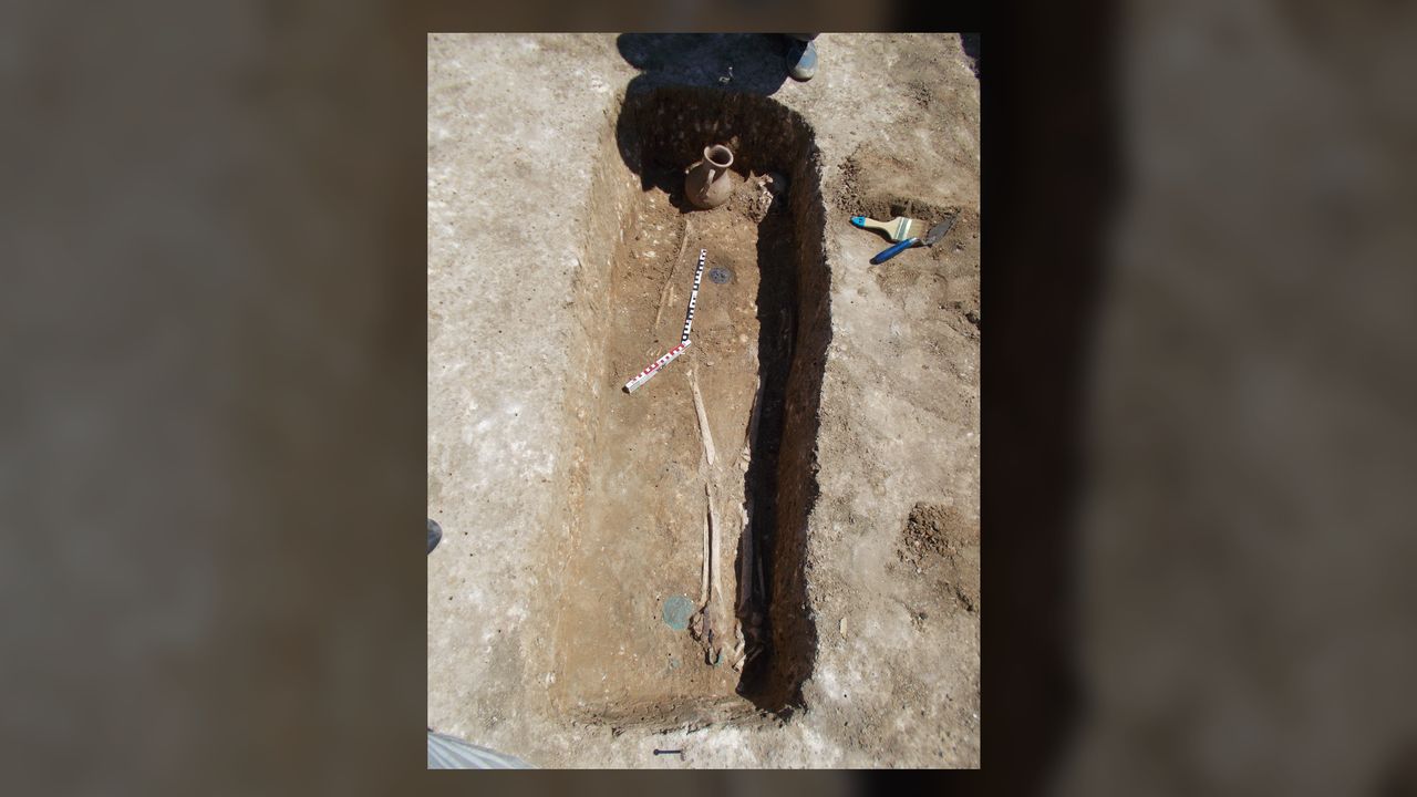The finds include this grave of a young woman, possibly a priestess, who was buried in the first century B.C. with a medallion portraying the Greek goddess Aphrodite.