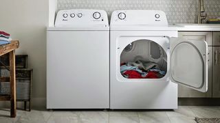 Amana NED4655EW 6.5 Cu. Ft. Electric Dryer open with laundry inside