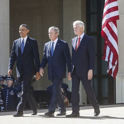 Former presidents Barack Obama, George Bush, and Bill Clinton.