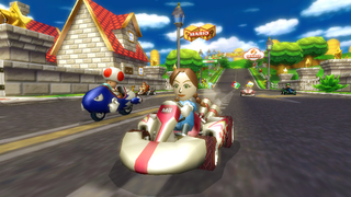 People racing in Mario Kart Wii
