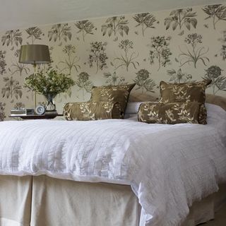 bedroom with floral wallpaper