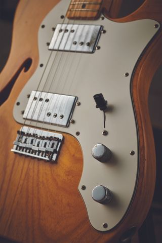 A photo of a blond Fender Telecaster Thinline from the 1970s boasting Seth Lover's Wide Range Humbucker pickup