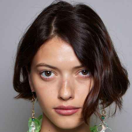 a bouncy layered bob seen on a model during fashion week