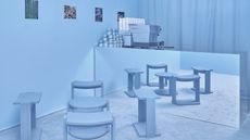 a light blue coffee shop with a chrome counter