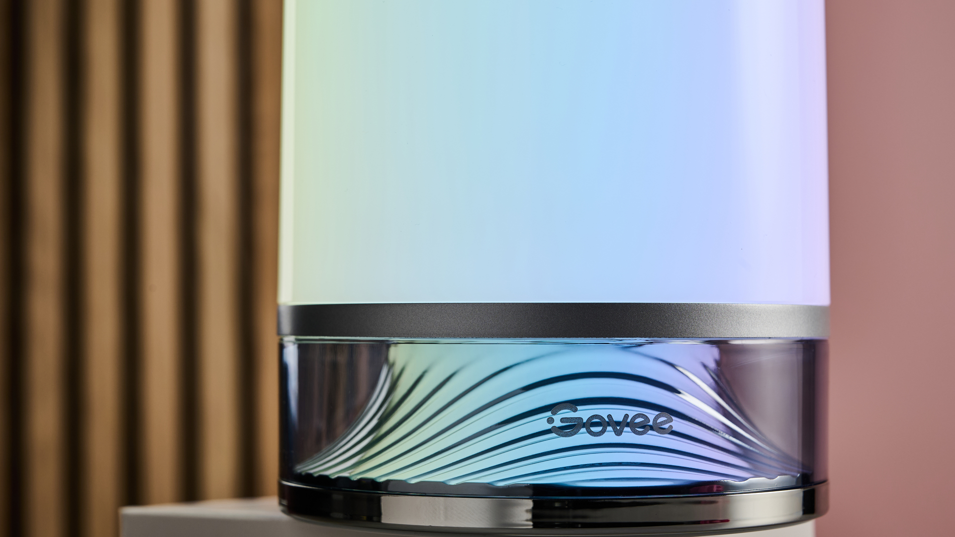 The base of the Govee Table Lamp 2 is lit up in blues, greens, and purples.