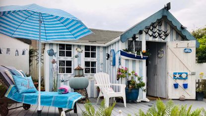 Cuprinol shed of the year: A shed painted with light blue and white stripes