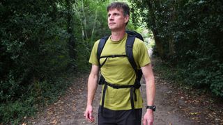 Man wearing Berghaus Remote Hike 35 on the trail