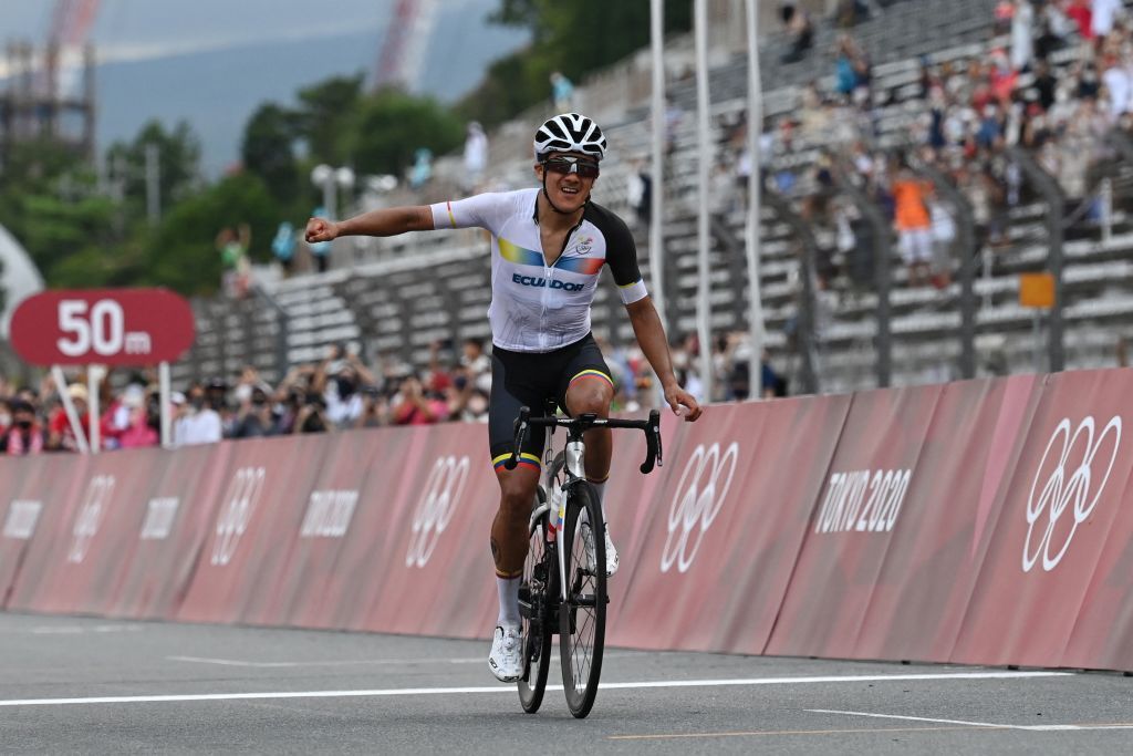 Ecuadors Richard Carapaz celebrates after crossing the finish line to win the mens cycling road race during the Tokyo 2020 Olympic Games at the Fuji International Speedway in Oyama Japan on July 24 2021 Photo by Greg Baker AFP Photo by GREG BAKERAFP via Getty Images