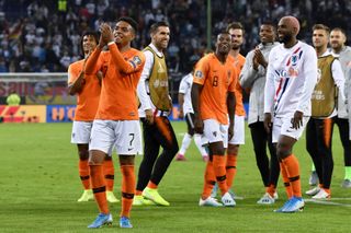 Dutch players celebrate their win over Germany