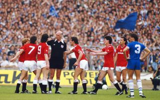 Manchester United players protest to referee Peter Willis as Kevin Moran (centre) is sent off for a foul on Peter Reid in the 1985 FA Cup final.