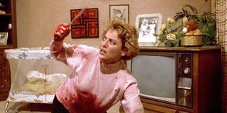 Viriginia Madsen as Helen Lyle with bloody knife in Candyman