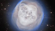 A glowing ball of white gas in the darkness of space