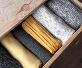File folded clothes organized in a dresser drawer