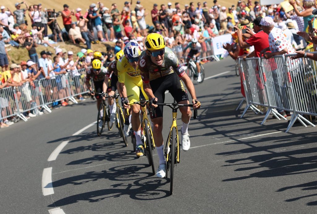 JumboVisma teams Belgian rider Tiesj Benoot R and JumboVisma teams Belgian rider Wout Van Aert C wearing the overall leaders yellow jersey cycles in a breakaway during the 4th stage of the 109th edition of the Tour de France cycling race 1715 km between Dunkirk and Calais in northern France on July 5 2022 Photo by Thomas SAMSON AFP Photo by THOMAS SAMSONAFP via Getty Images