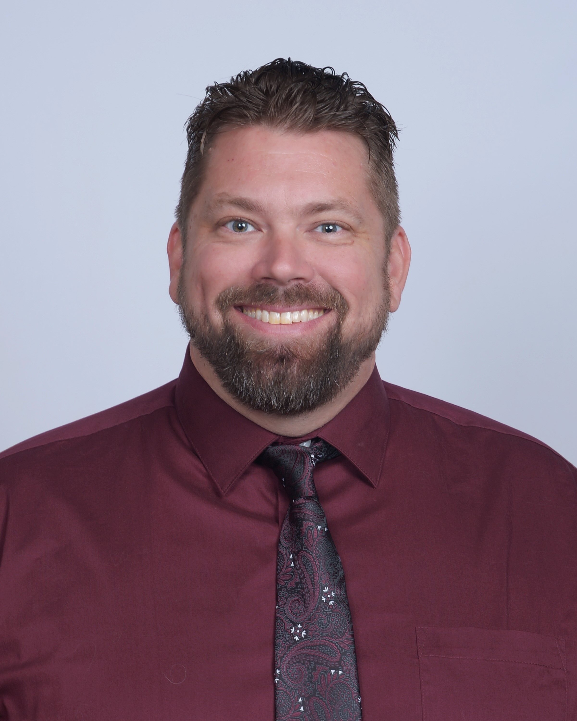 Smiling headshot of Eric Webb.