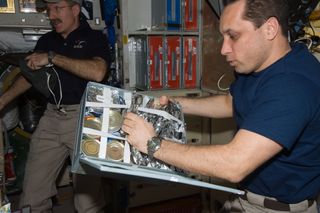 . Cosmonaut Grabs Lunch on Expedition 30