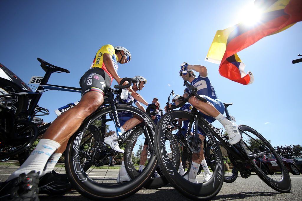 Fernando Gaviria's Quick-Step teammates congratulate each other on a job well done after winning stage 5 of the 2018 Tour of California