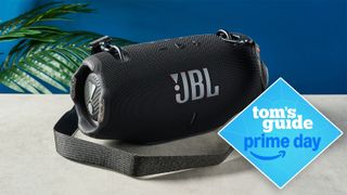 the jbl xtreme 4 bluetooth speaker in black with a tom's guide prime day deals badge