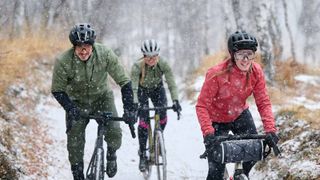 People cycling in the snow