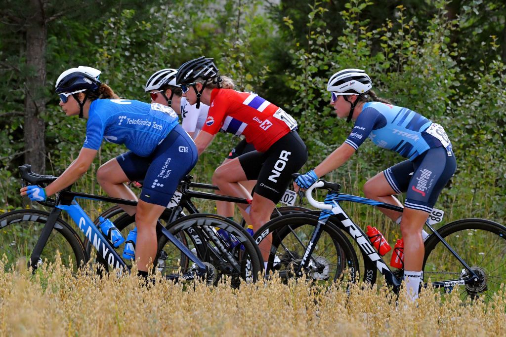 NOREFJELL NORWAY AUGUST 14 LR Sheyla Gutierrez Ruiz of Spain and Movistar Team Women Birgitte Andersen Nilssen of Norway and Team Norway and Shirin Van Anrooij of Netherlands and Team Trek Segafredo compete during the 7th Ladies Tour Of Norway 2021 Stage 3 a 145k stage from Drammen to Norefjell 791m LTourOfNorway LTON21 UCIWWT on August 14 2021 in Norefjell Norway Photo by Luc ClaessenGetty Images