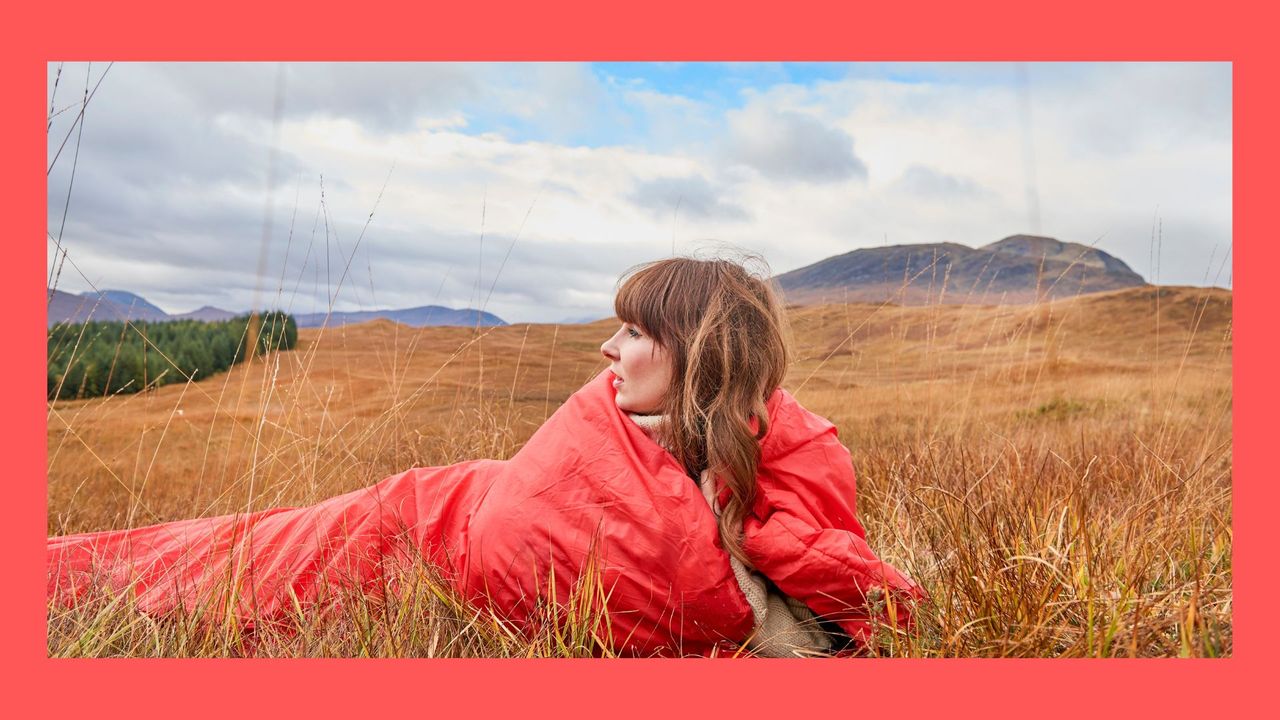 Girl in sleeping bag camping alone