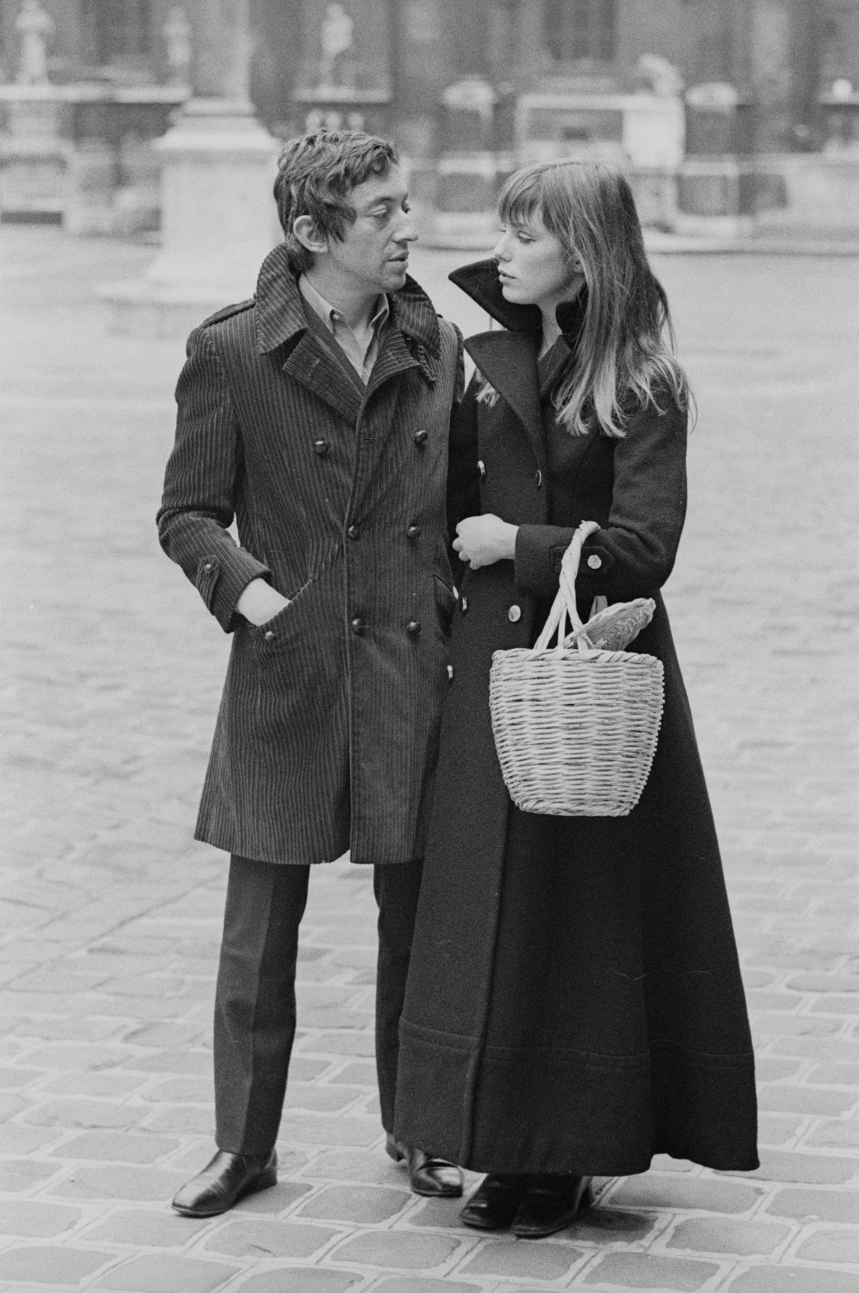 Jane Birkin wore a basket bag with a long trench coat in 1969