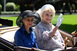 Birgitte, Duchess of Gloucester and Princess Michael of Kent arrive in an open carriage to attend Royal Ascot 2022 at Ascot Racecourse otn June 14, 2022 in Asco