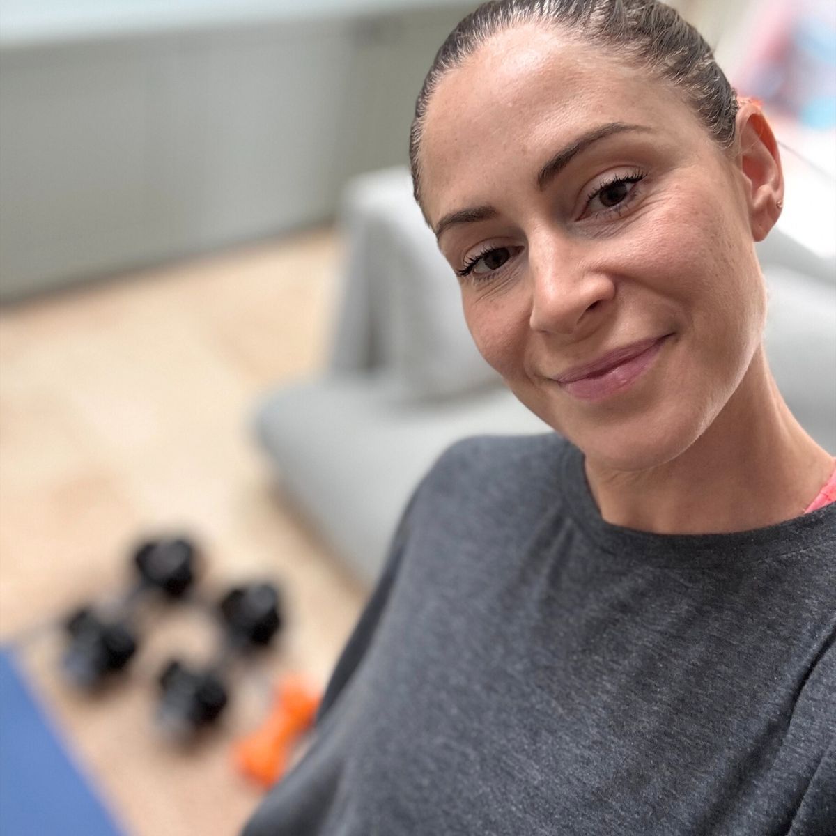 Best 15 minute home workouts: Anna at home, doing one of her favourite sweat sessions