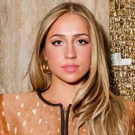 Tate McRae attended a Valentino event in a deer-print jacket and the cigarette jeans trend
