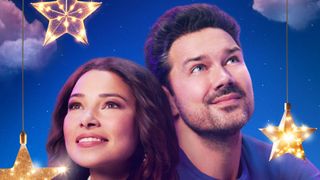 Ryan Paevey and Jessica Parker Kennedy on the promo poster for Under the Christmas Sky on Hallmark Channel