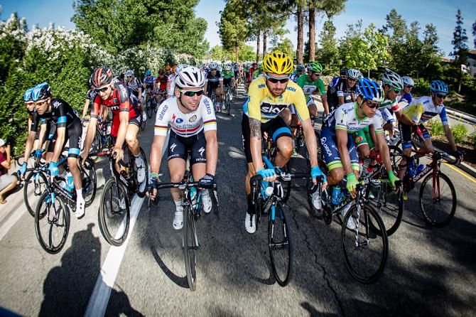 Bradley Wiggins (Sky) and Mark Cavendish (Omega Pharma-Quickstep) have a chat during the morning rollout.