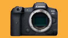 Image shows a Canon EOS R5 on an orange background