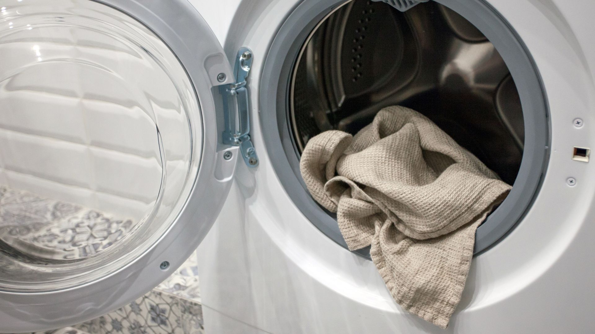 picture of tumble dryer with towel hanging out