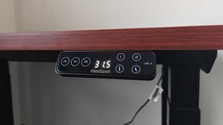 Flexispot E7 Plus digital controls attached to wood top