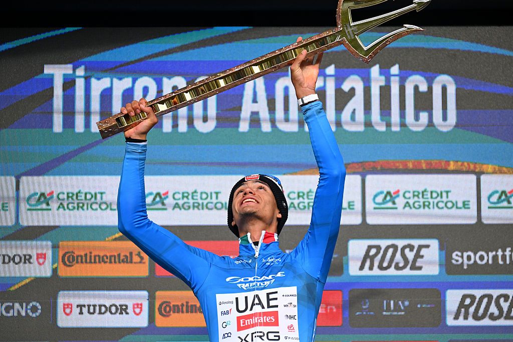SAN BENEDETTO DEL TRONTO, ITALY - MARCH 15: Isaac Del Toro of Mexico and UAE Team Emirates - XRG celebrates at podium as Blue Leader Jersey winner with the Trident Race Trophy during the 61st Tirreno-Adriatico 2026, Stage 7 a 142km stage from Civitanova Marche to San Benedetto del Tronto / #UCIWT / on March 15, 2026 in San Benedetto del Tronto, Italy. (Photo by Tim de Waele/Getty Images)