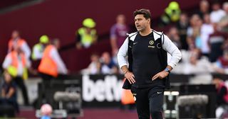 Chelsea manager Mauricio Pochettino looks on during the Premier League match between West Ham United and Chelsea FC at London Stadium on August 20, 2023 in London, England.