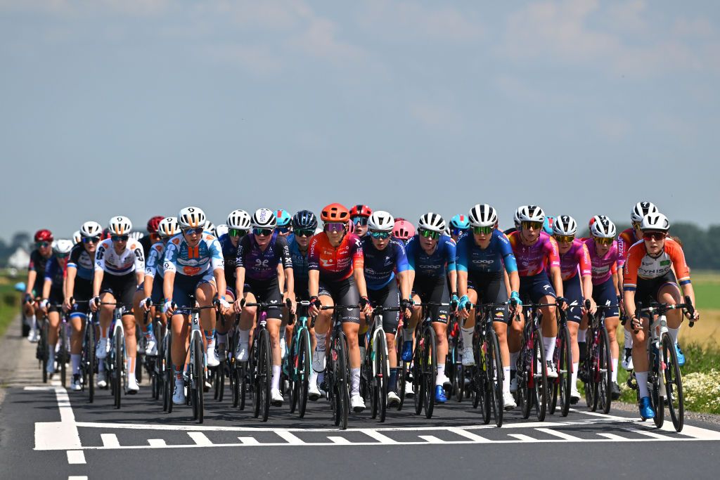 KNOKKEHEIST BELGIUM JULY 18 A general view of Wiktoria Pikulik of Poland and Team Human Powered Health Femke Gerritse of The Netherlands Christine Majerus of Luxembourg and Team SD Worx Protime and a general view of the peloton competing during the 10th Baloise Ladies Tour 2024 Stage 1 a 1138km stage from Breskens to KnokkeHeist on July 18 2024 in KnokkeHeist Belgium Photo by Luc ClaessenGetty Images
