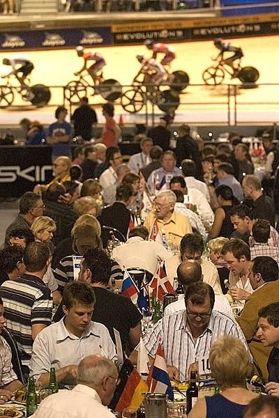 Patrons dine on the infield at Hisense Arena as the Madison goes on around them.
