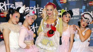 Gwen Stefani with her backing dancers at the 2005 Brit Awards