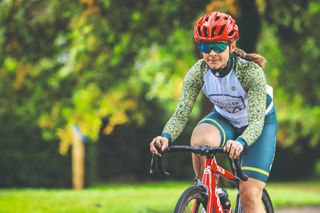 Female cyclist riding her bike