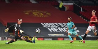 Mohamed Salah scores Liverpool's fourth goal at Old Trafford last season