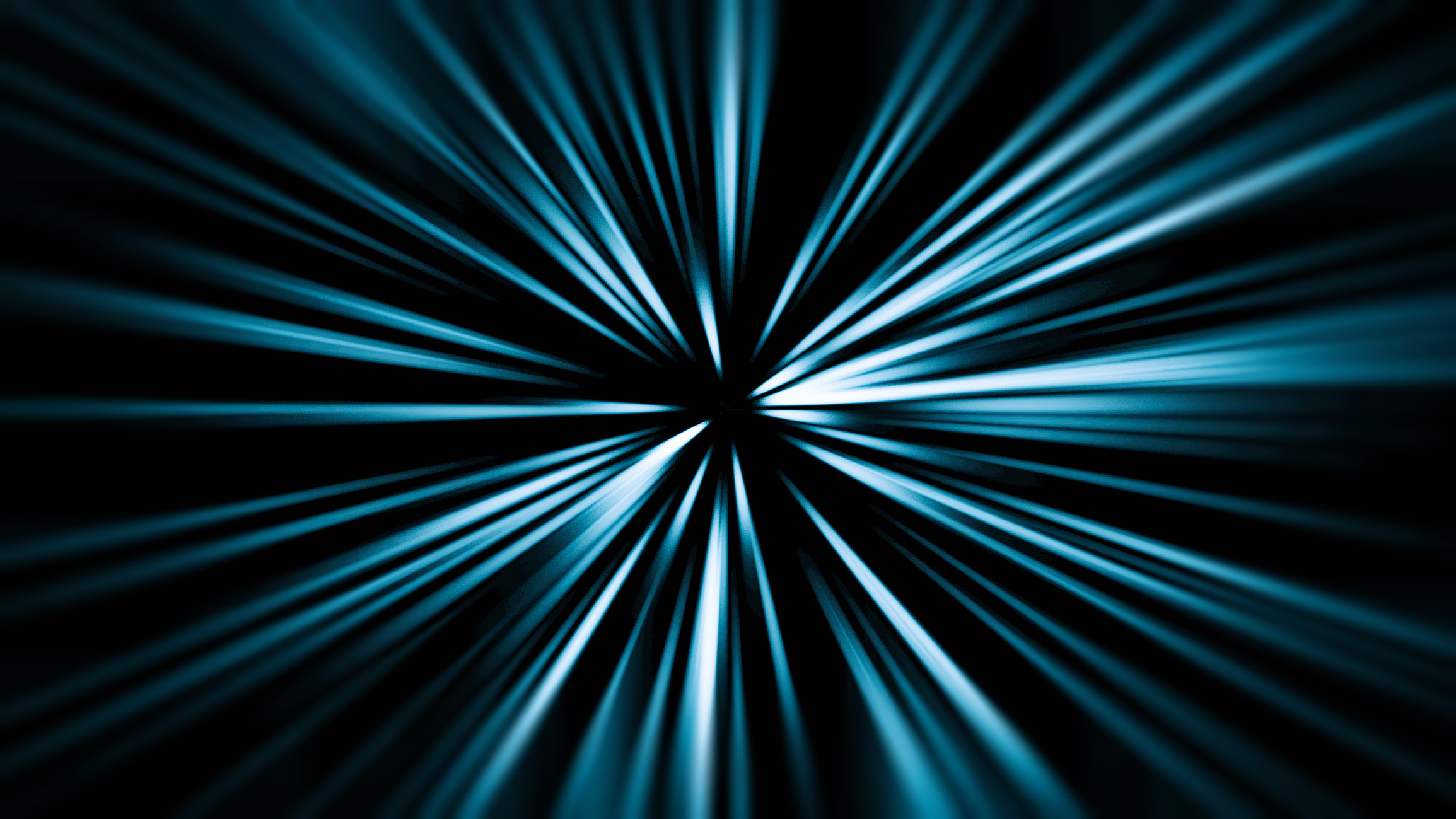 Blue light streaks radiate from a central point on a black background.