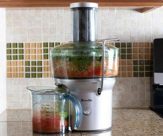 Breville Juice Fountain on a kitchen counter.