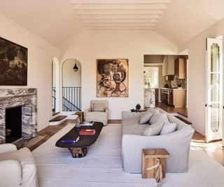 living room white walls marble fireplace