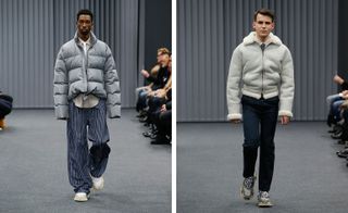 A separate front on view of two different models on the catwalk, both in coats with a grey backdrop