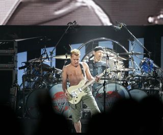 Eddie Van Halen (foreground) and Alex Van Halen perform onstage at the Mandalay Bay Events Center in Las Vegas